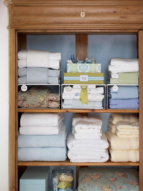 Linen Closet Organization with Baskets: A simple way to eliminate visual  clutter